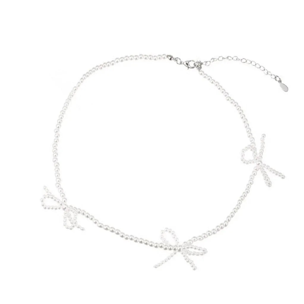 White geometric bow pearl necklace for women with adjustable 31-40cm length