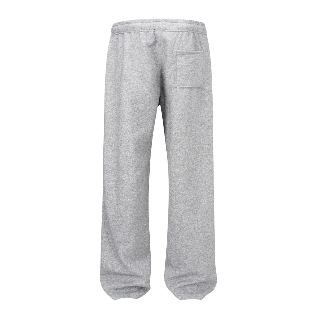 Men's cotton straight leg trousers in black colour showing wide-leg loose fit design