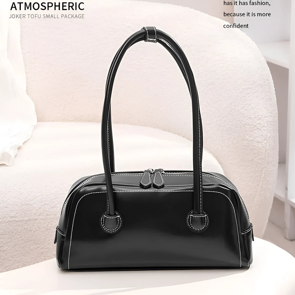 Retro PU underarm bag for women, horizontal square 31x9x14 cm, with zipper phone and file pockets.