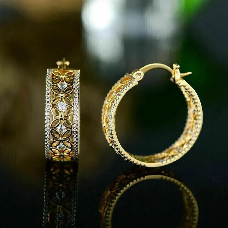 Women's yellow gold coloured geometric horse eye butterfly ear clips made from copper.