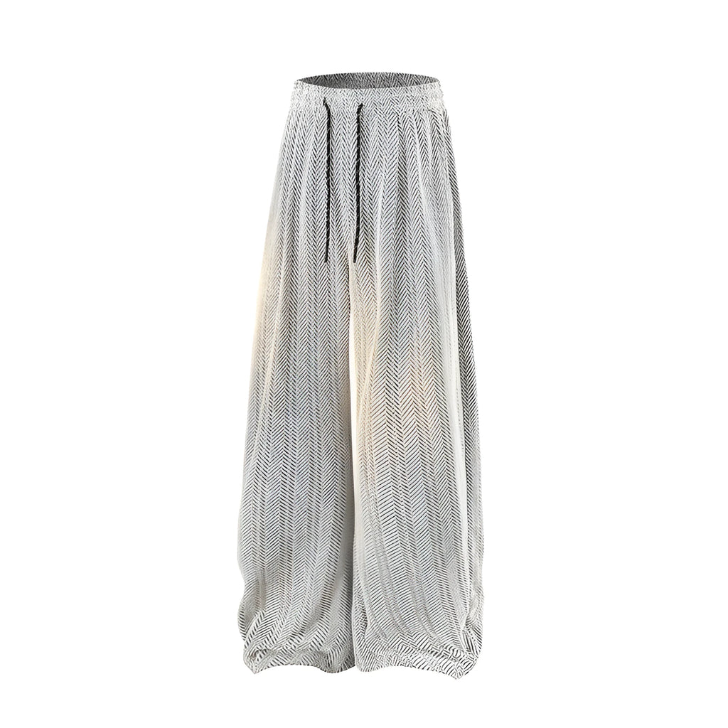 Light grey fleece-lined straight-leg trousers with a hollow-out sports design on a hanger.