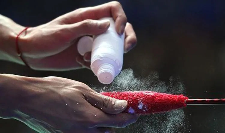 White magnesium carbonate anti-slip powder in container for sports grip.