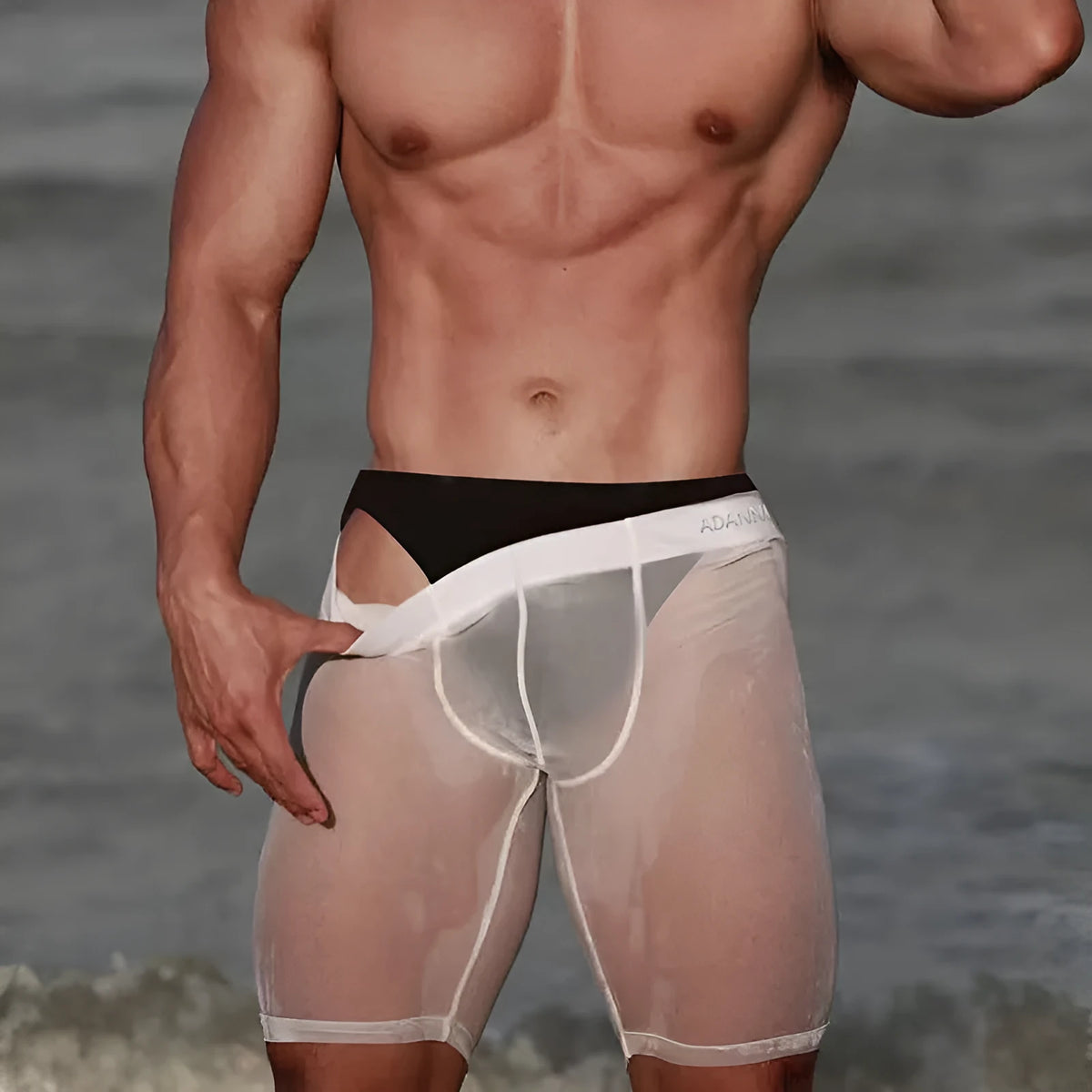 Men's mesh home shorts in black nylon fabric with seamless construction and hip-lifting design