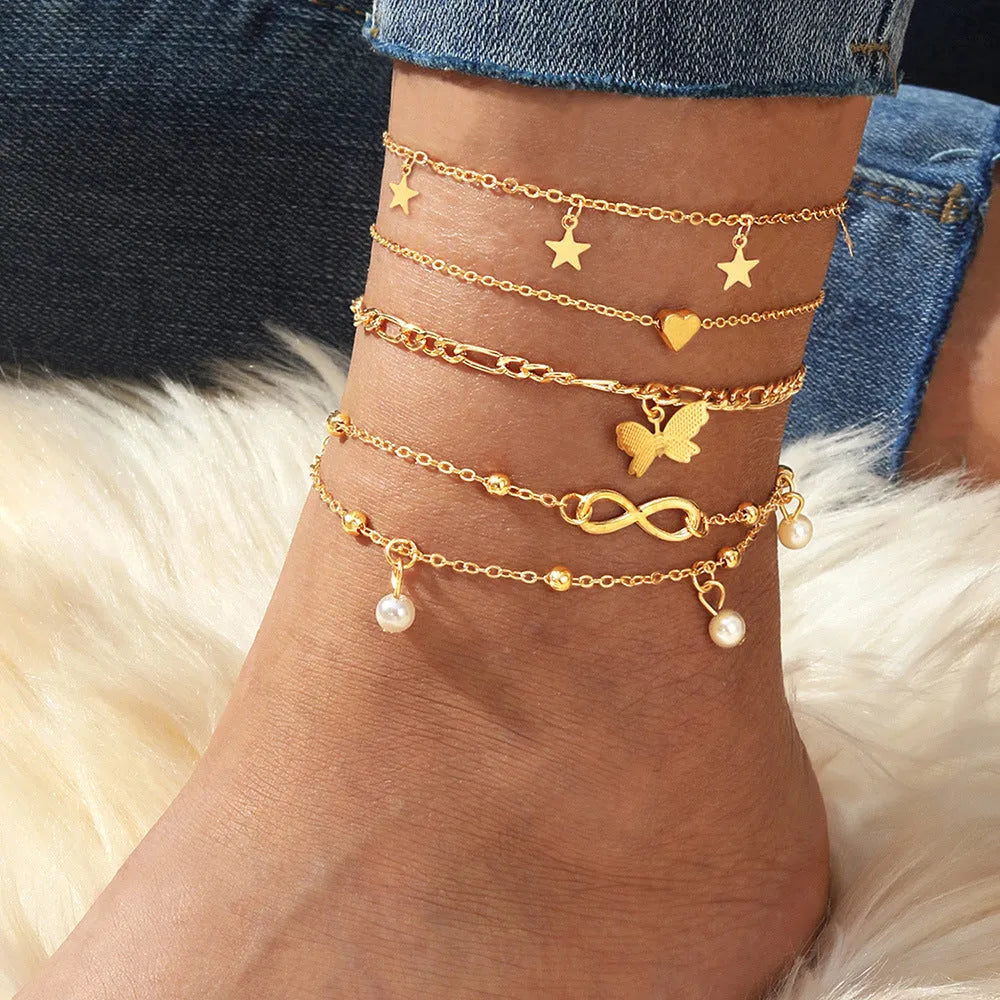 Four-piece butterfly pearl heart anklet set with alloy multi-layered foot chain jewellery