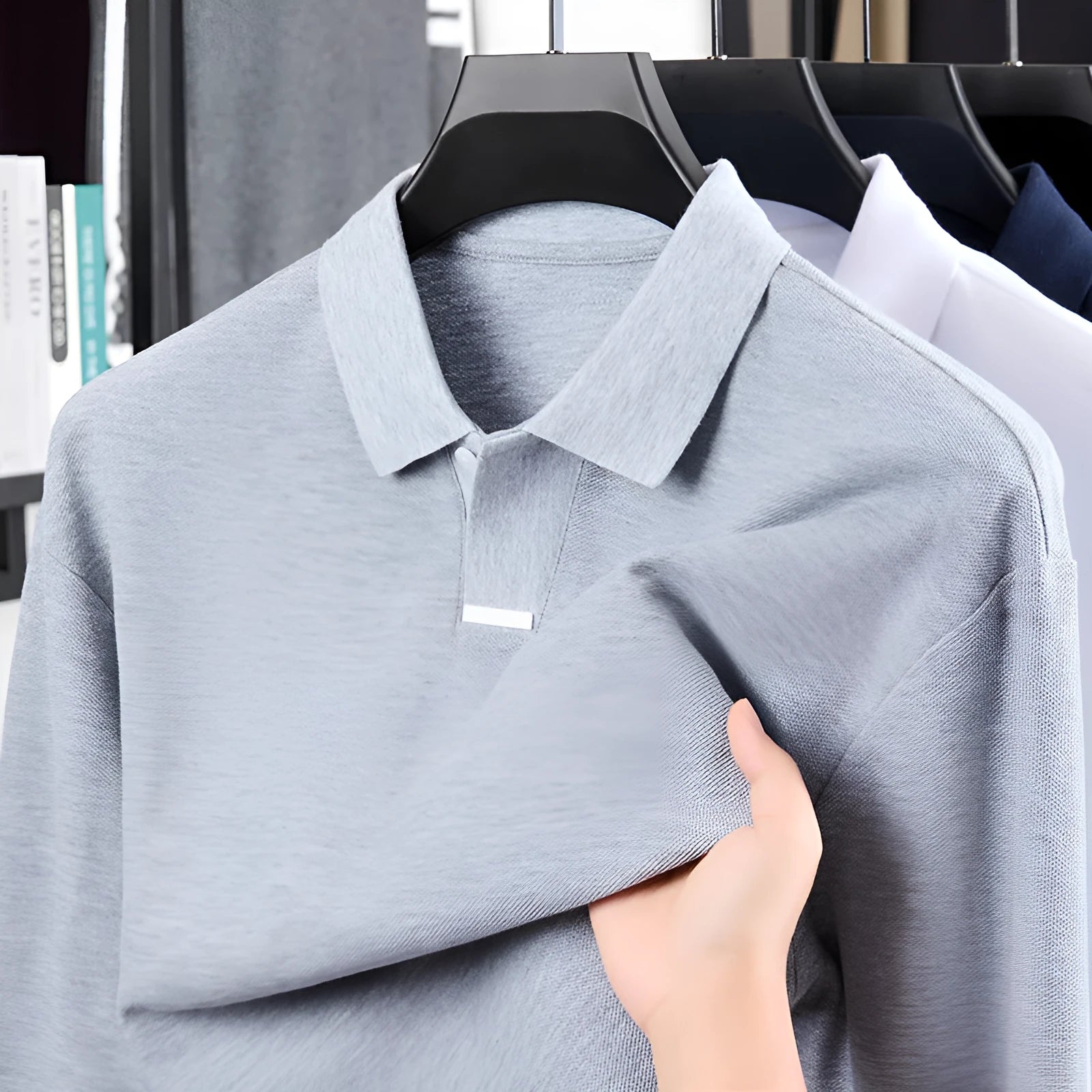 Men's cotton polo shirt in loose fit with lapel collar shown in available colours with size chart