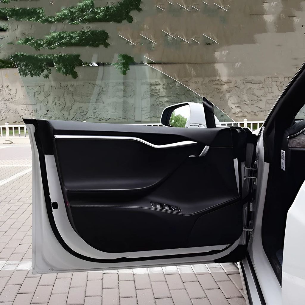 Four-piece carbon fibre pattern protective film kit for Tesla Model S car door interior panels.
