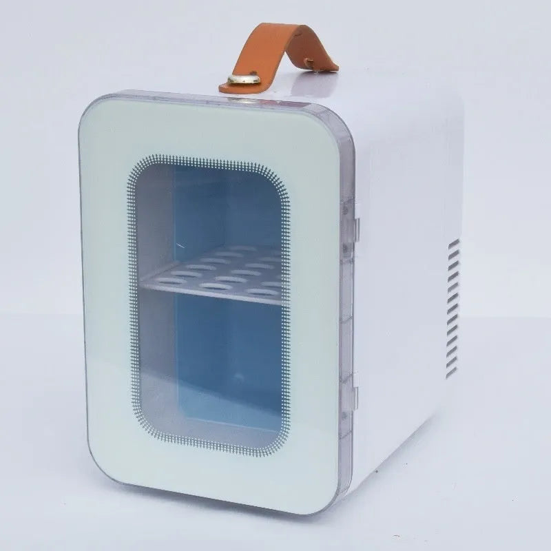 Pink mini refrigerator with transparent door showing 6L capacity for car and home hot and cold use