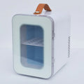 Pink mini refrigerator with transparent door showing 6L capacity for car and home hot and cold use