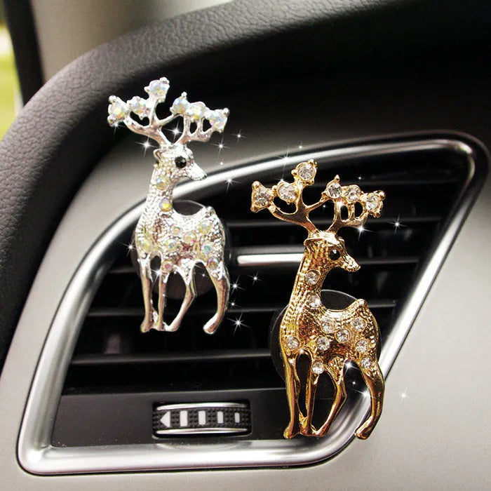 Alloy car air vent fragrance clip in a decorative handbag style.