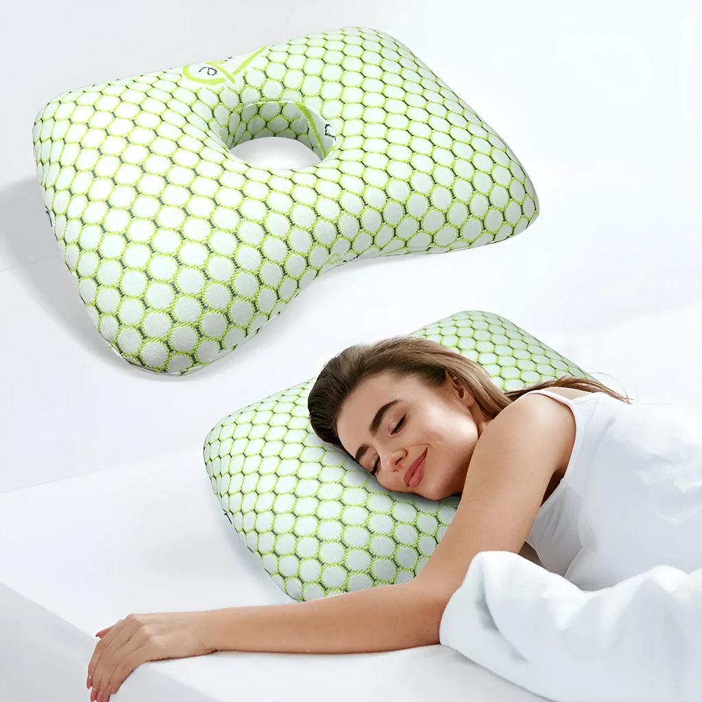 Beauty salon single hole ear pillow for adults in grey colour on a treatment bed.