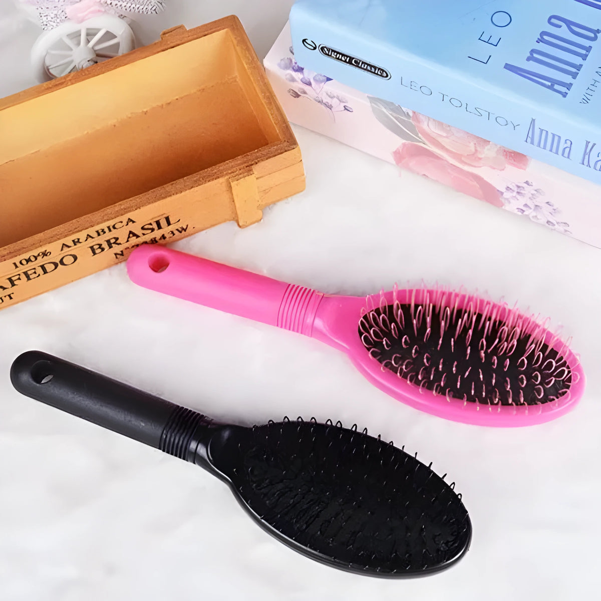 Black plastic ring tooth hair extension comb measuring 22cm by 6cm for hairdressing use