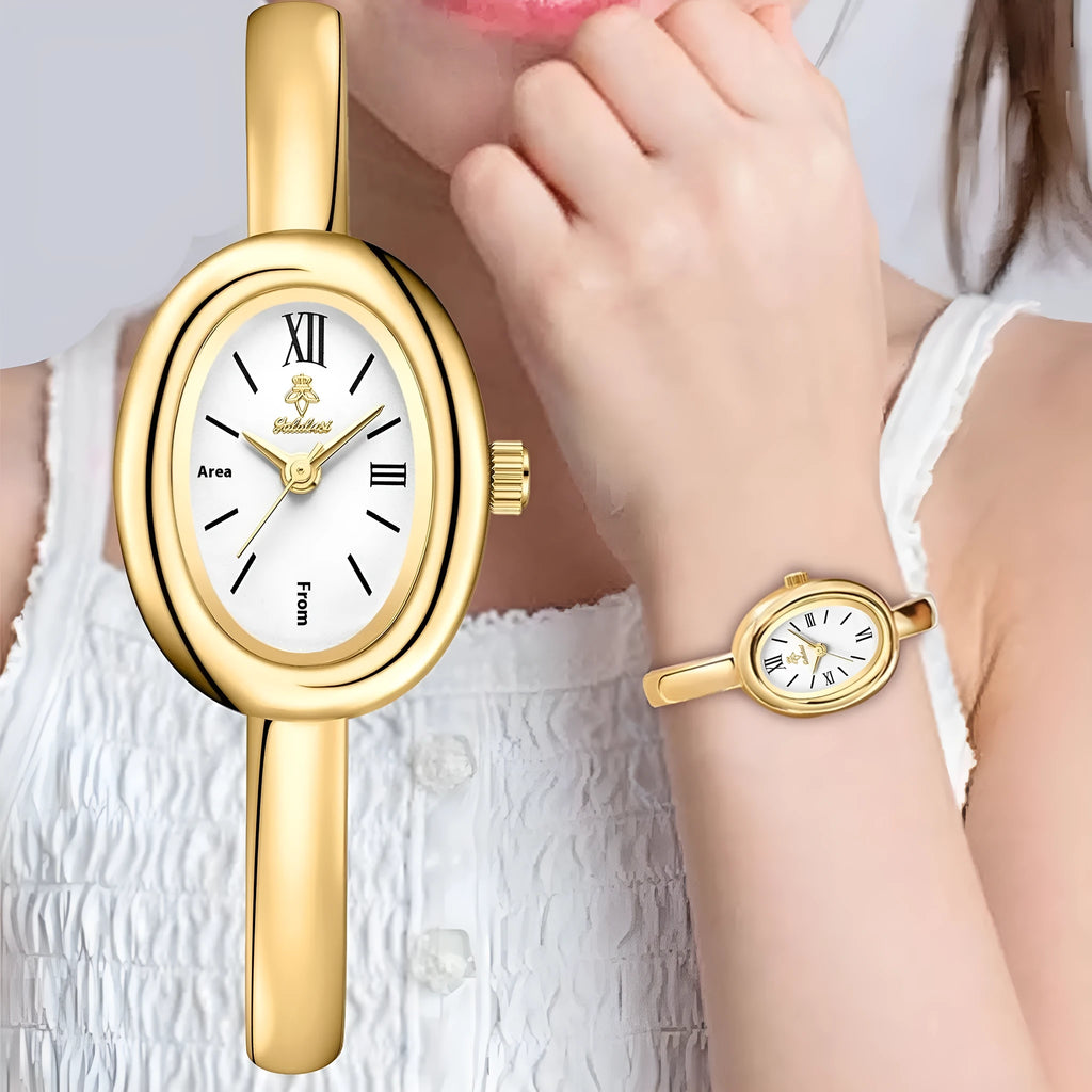 Women's oval retro quartz watch in gold colour with spiral pattern dial, showing 8mm thickness