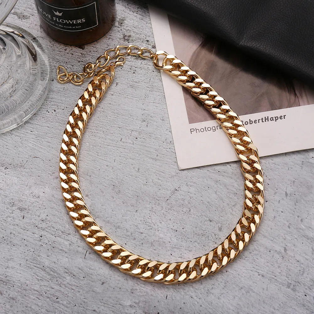 Gold women's thick chain necklace with 6cm pendant on 32cm chain, electroplated alloy construction