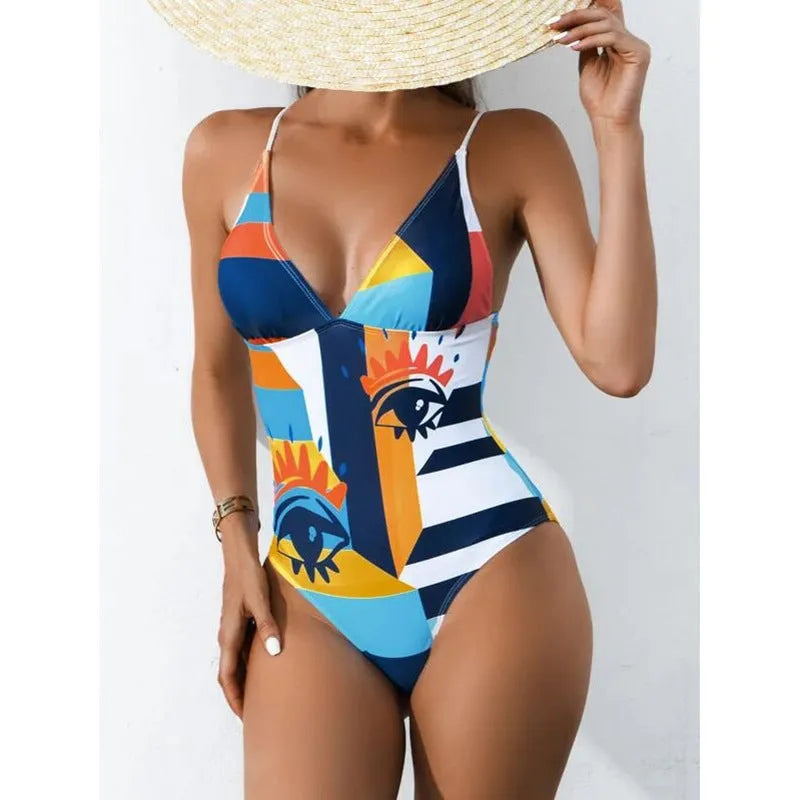 Women's plus size printed bikini swimsuit in solid blue, purple, green, or pink colours with backless design