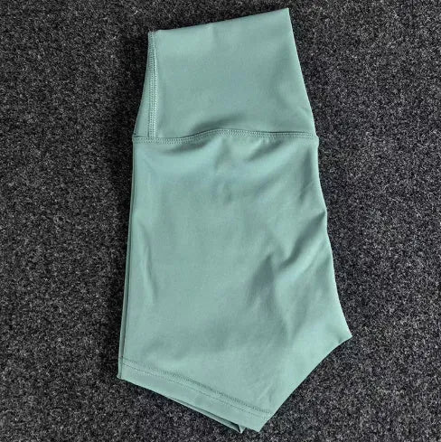 Ladies high-waist yoga shorts in moisture-wicking nylon fabric, shown in various colours