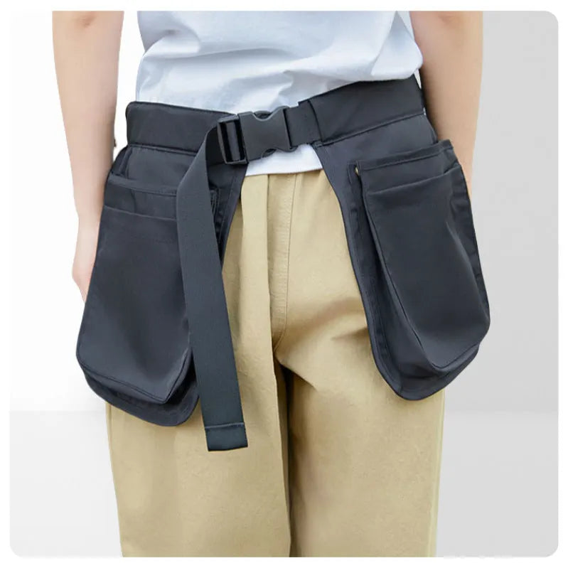 Unisex polyester waist bag with multi-pocket design, adjustable belt, available in black or army green.