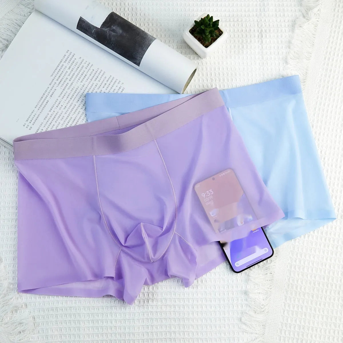 Ice silk seamless boxer briefs for men in solid colours showing ultra-thin transparent fabric