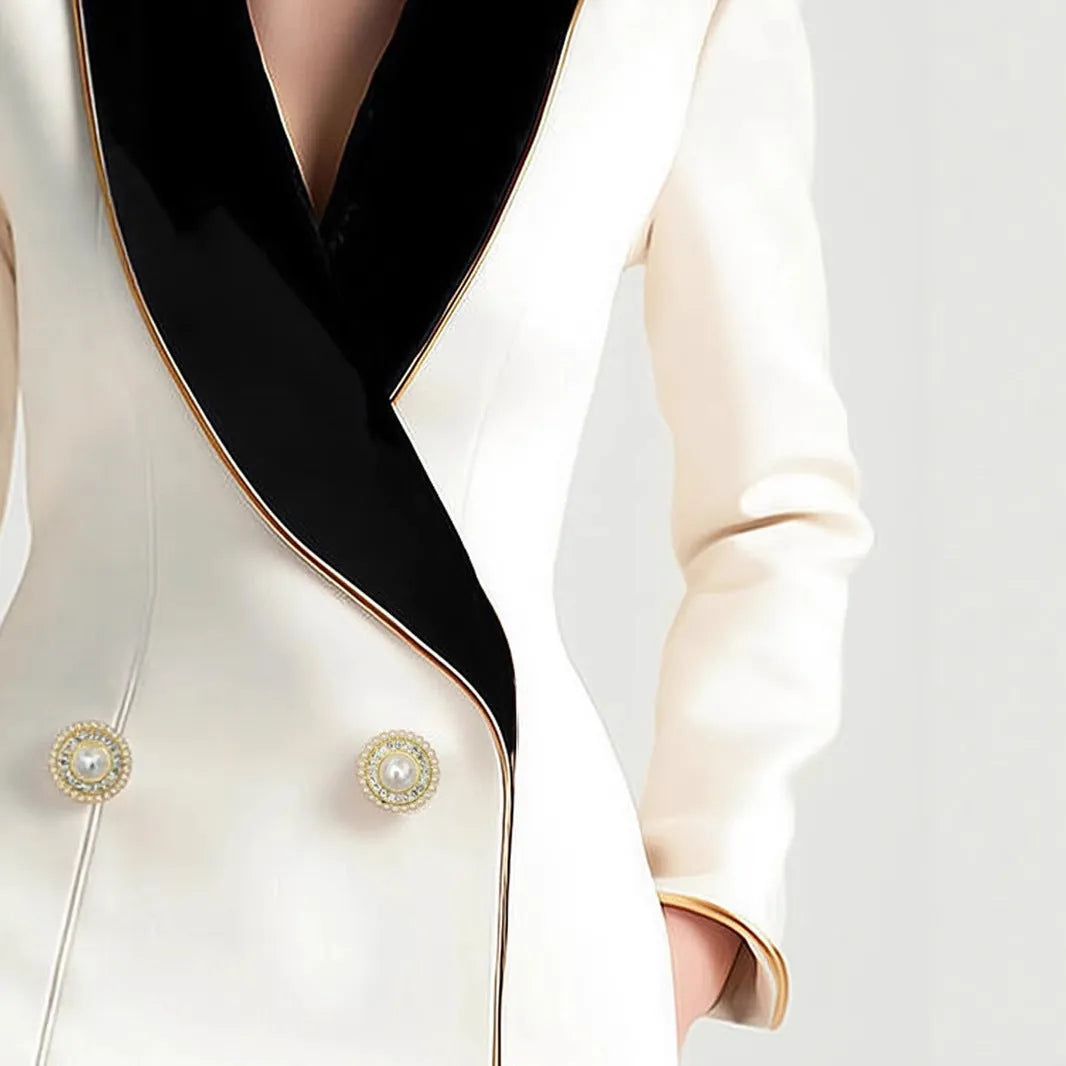 Women's milky white coat with irregular hem and golden pearl buttons on long sleeves
