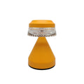 Creative USB-powered LED night lamp in black, brown, and orange colour options on a wooden surface.