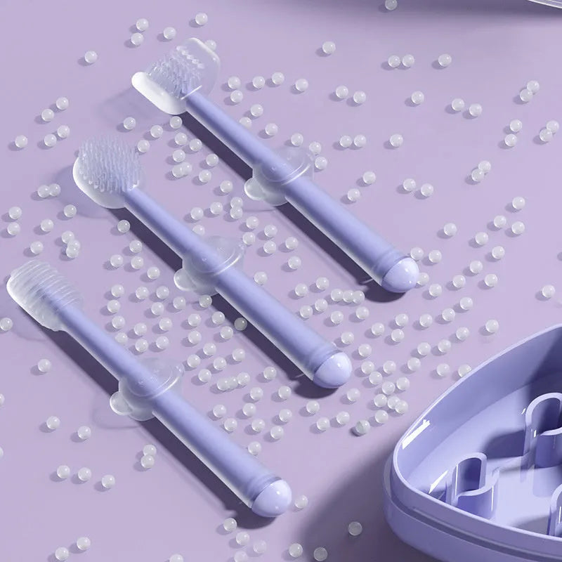 Soft silicone finger toothbrush for dog and cat dental care in purple, blue and green colours.