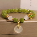 Women's green tourmaline four-leaf clover safety buckle bracelet in New Chinese style