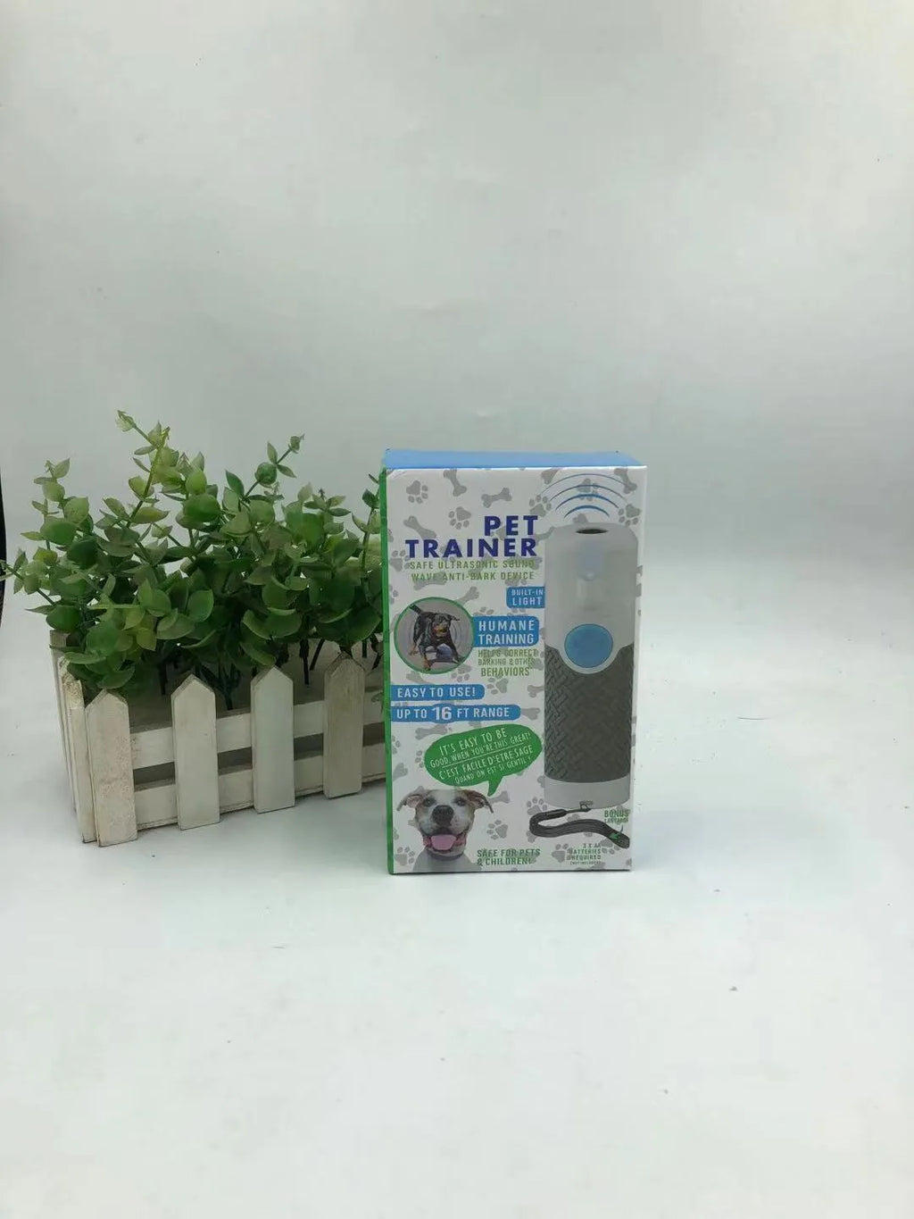 White handheld ultrasonic dog bark stop trainer device with ABS plastic construction