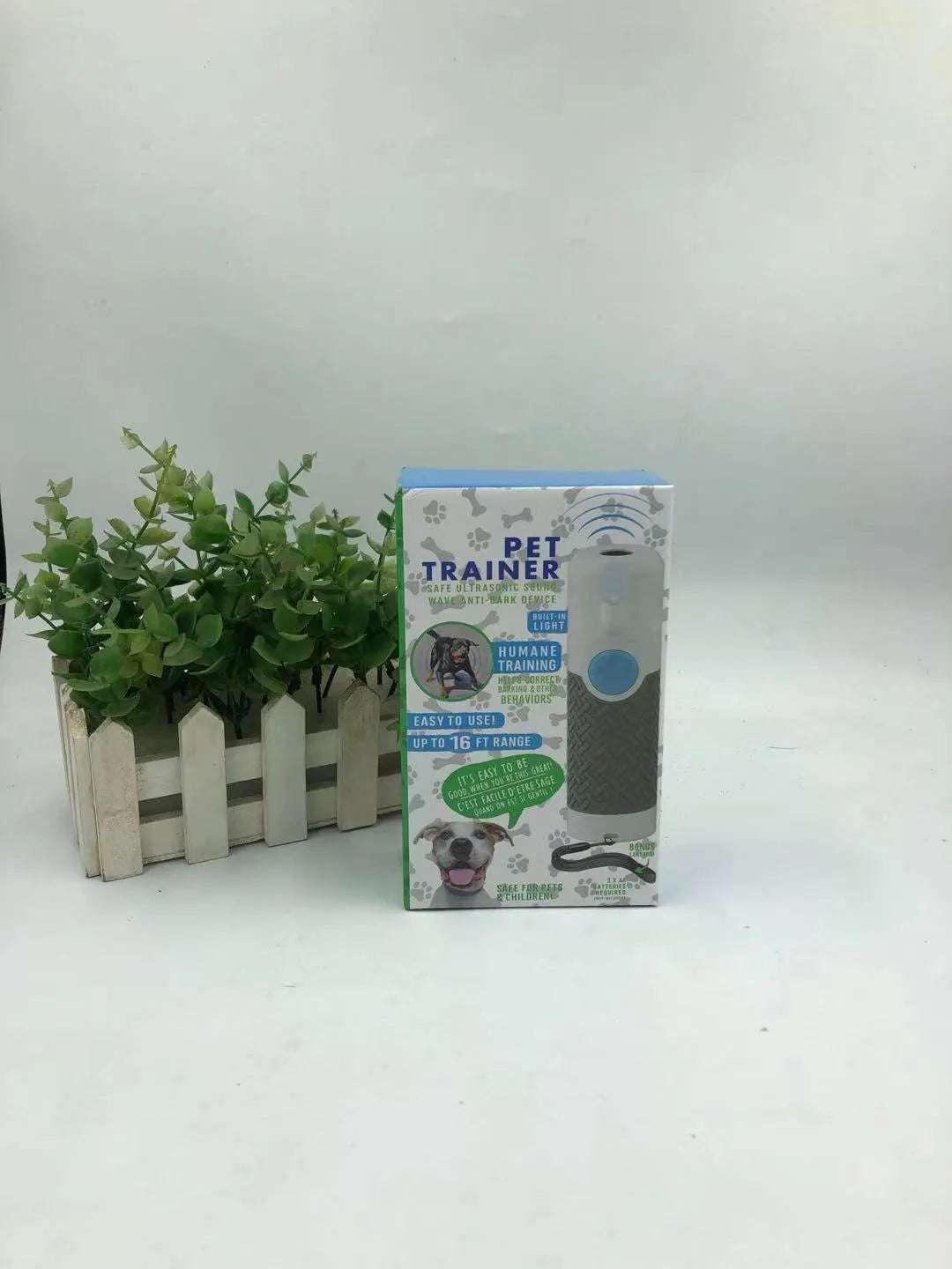 White handheld ultrasonic dog bark stop trainer device with ABS plastic construction