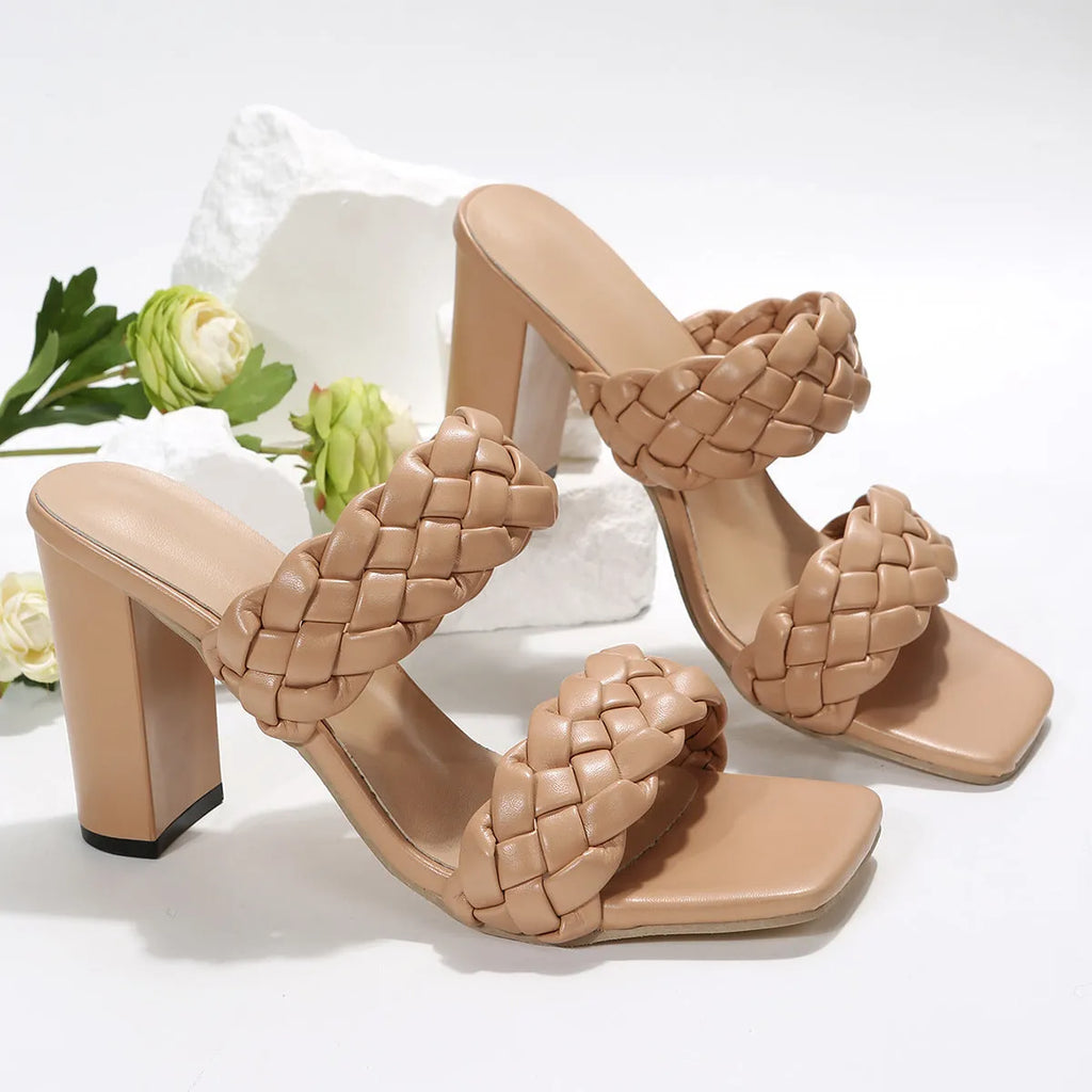 Square toe flip-flops with chunky heel and woven twisted straps in apricot colour.