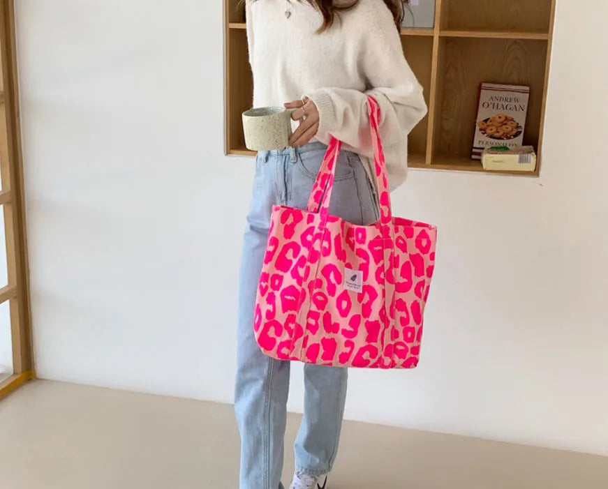 Women's large shoulder bag in oxford cloth with 3D pockets, shown in blue.