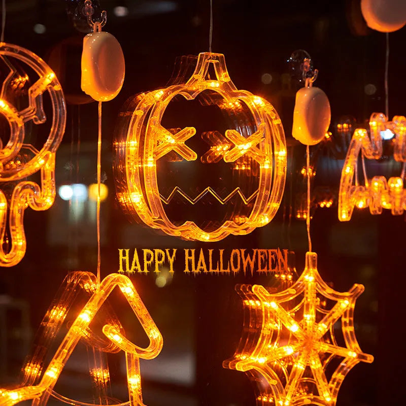 Halloween window hanging LED lights set with spider, pumpkin, and ghost decorations on suction cups