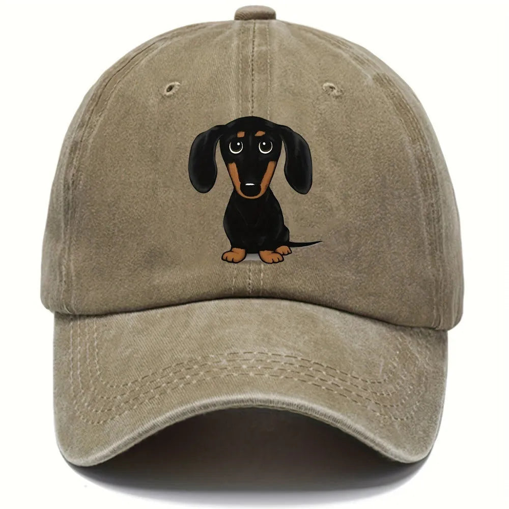 Retro washed blue cotton baseball cap with a machine-embroidered brown Dachshund dog graphic on the front.