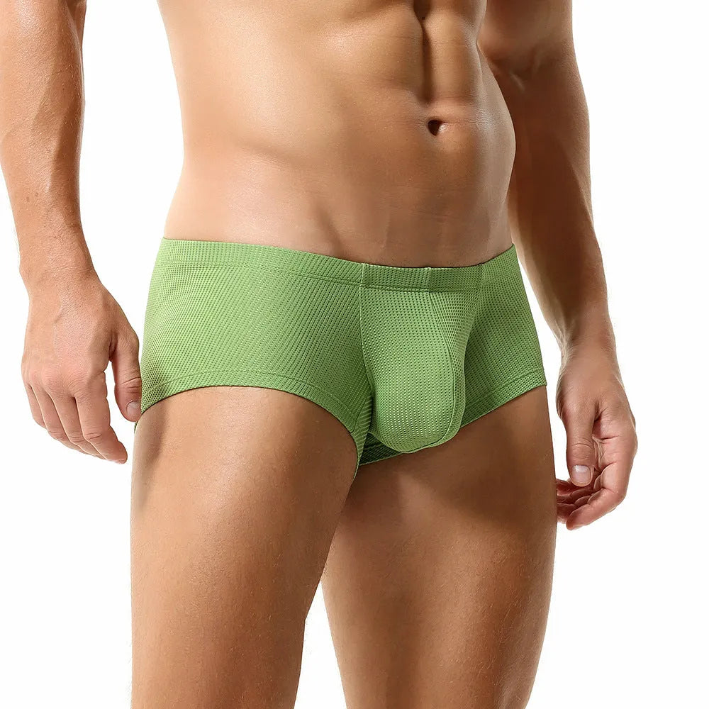 Men's solid colour nylon boxers with mid-low waist design in orange red, cloud blue, green, light blue, or beige