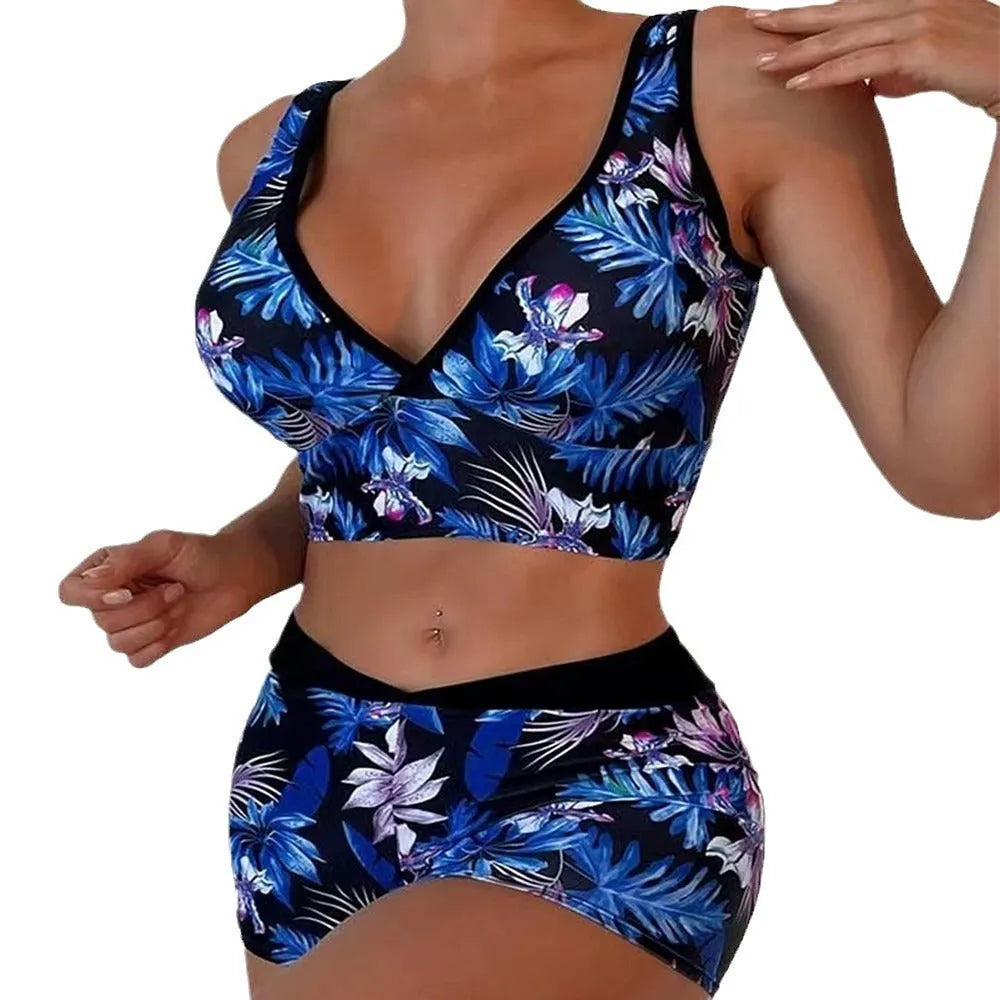 Women's two-piece printed swimsuit set with a sleeveless top and boxer-style briefs in a multicolour pattern.