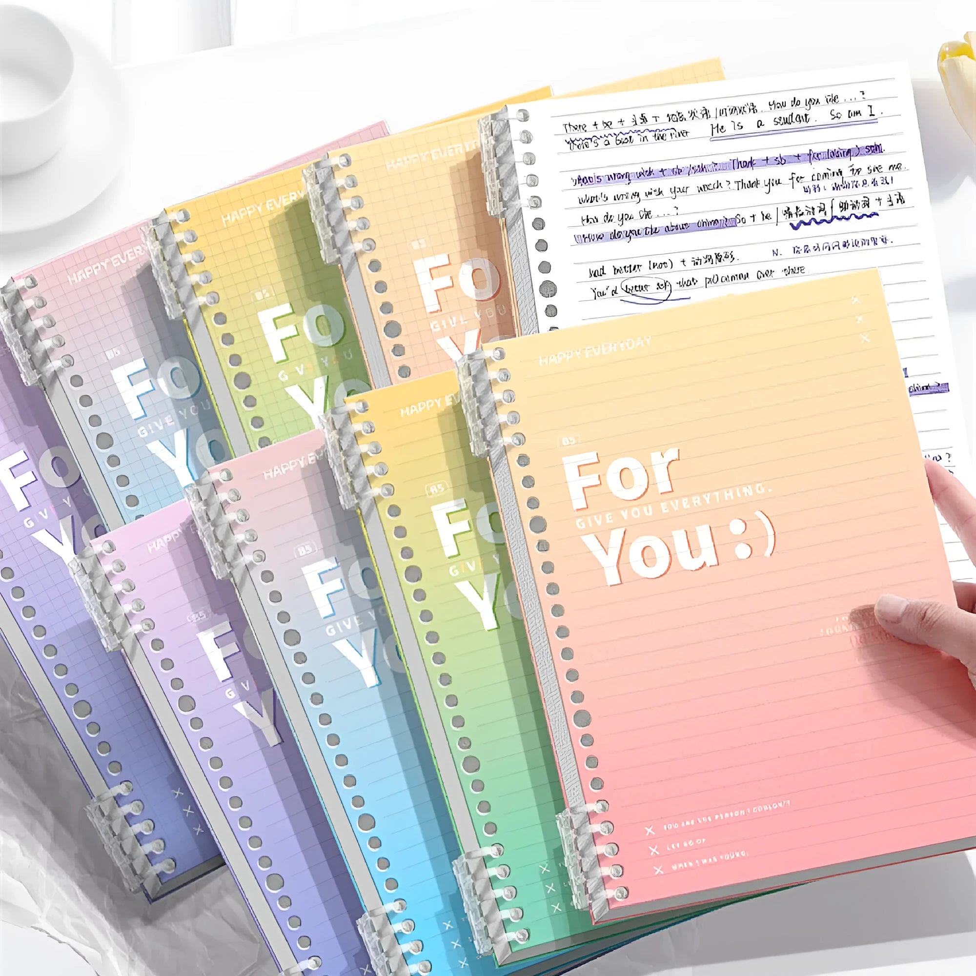 Removable coil gradient notebook with PP cover in blue, green, pink, and purple colour options