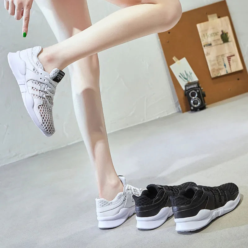 Low-top mesh sneaker with hollow-out detail and flat EVA sole in a slip-on style.