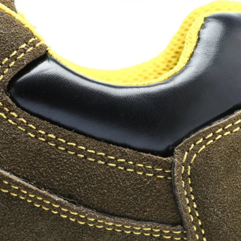 Bronze cow suede leather men's safety boots with a steel toe cap and patterned non-slip sole.