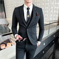 Slim fit business suit for men in black or dark grey with British style casual design