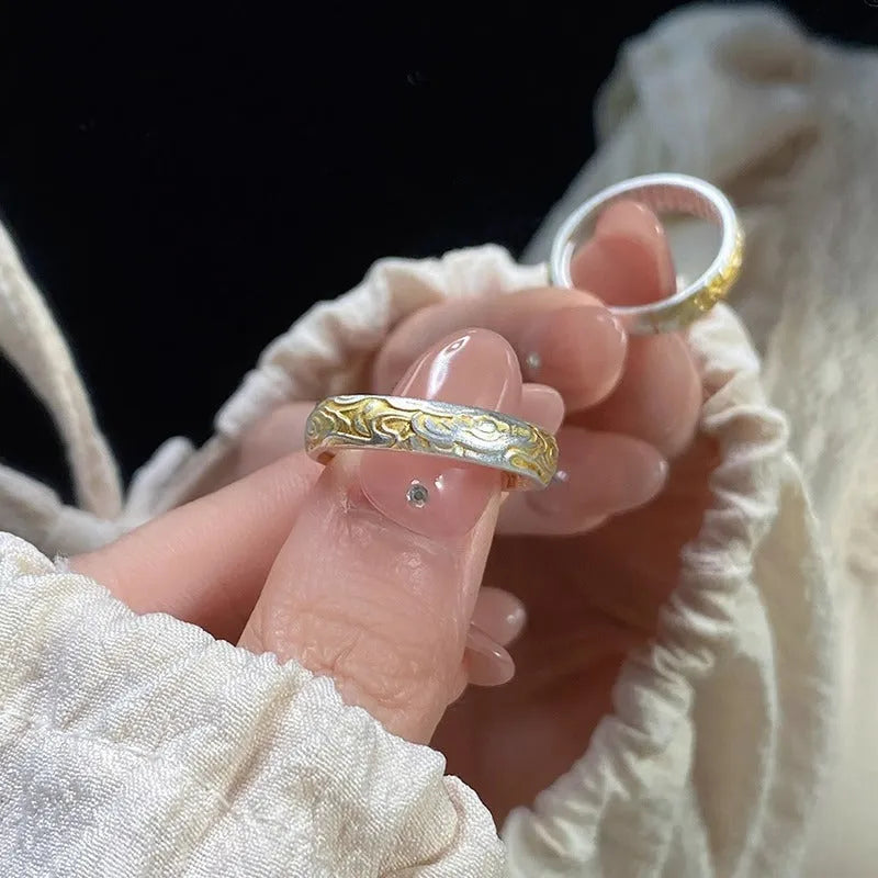 Adjustable open-mouth ring with geometric Xiangyun pattern in silver gold electroplated finish on white copper.