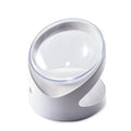 Clear plastic tilted cat food bowl for ergonomic feeding and neck protection