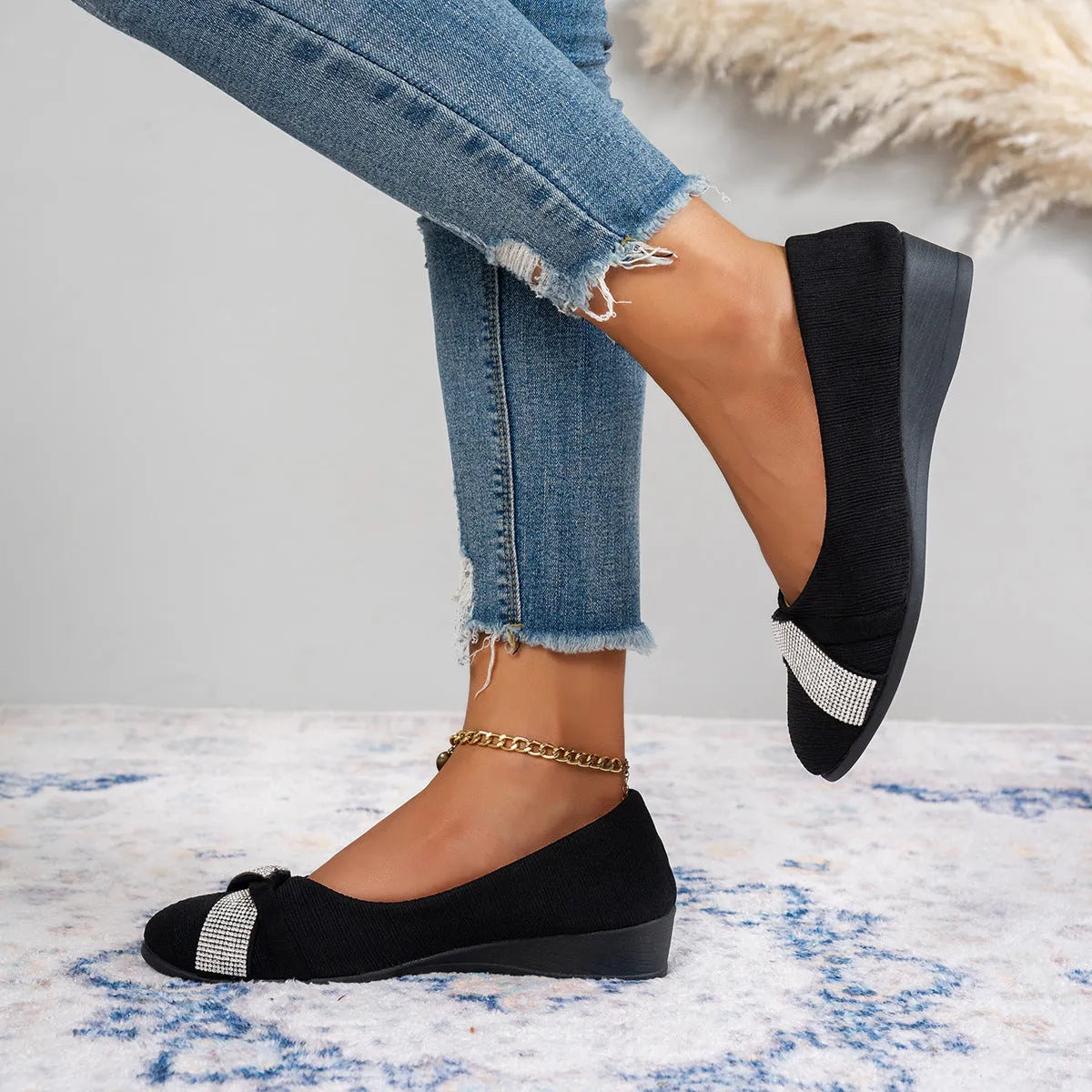 Black women's slip-on casual shoes with rhinestone detail and a chunky heel.
