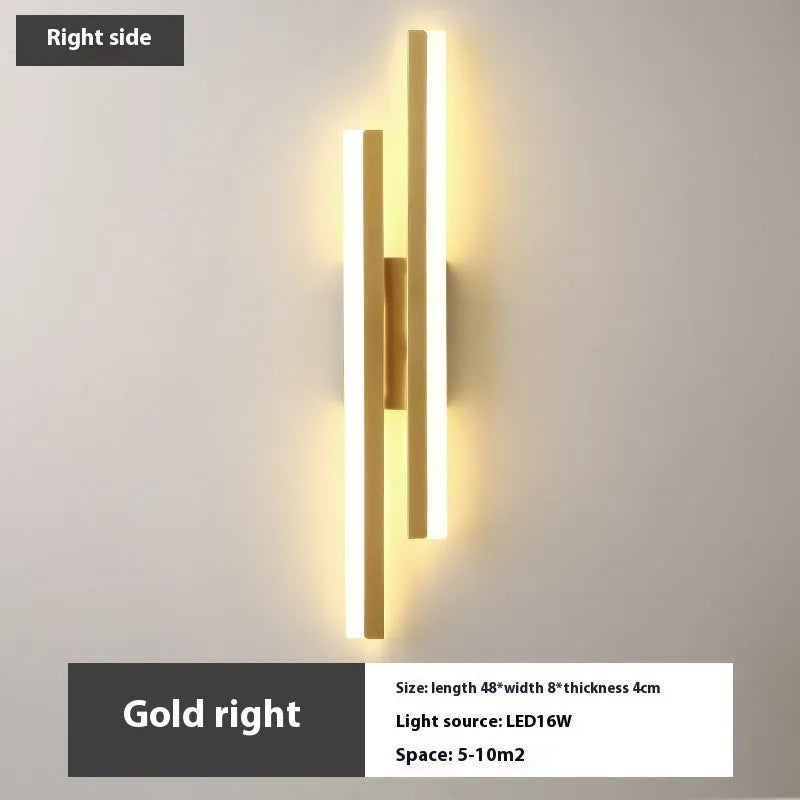 Scandinavian minimalist LED wall light with an acrylic shade on a black arm, mounted on a light-coloured wall.