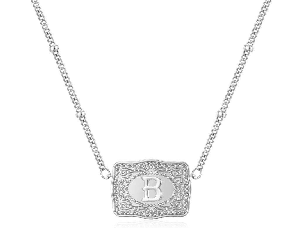 Copper electroplated necklace with a letter charm, available in gold or white k colour.