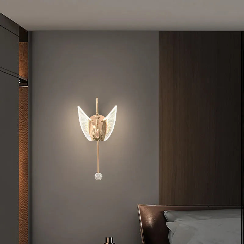 Gold modern minimalist swan-shaped wall lamp with acrylic shade and iron construction
