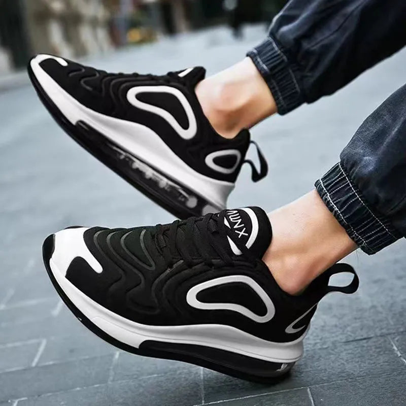 Men's black casual lace-up sneakers with thick sole and round toe design
