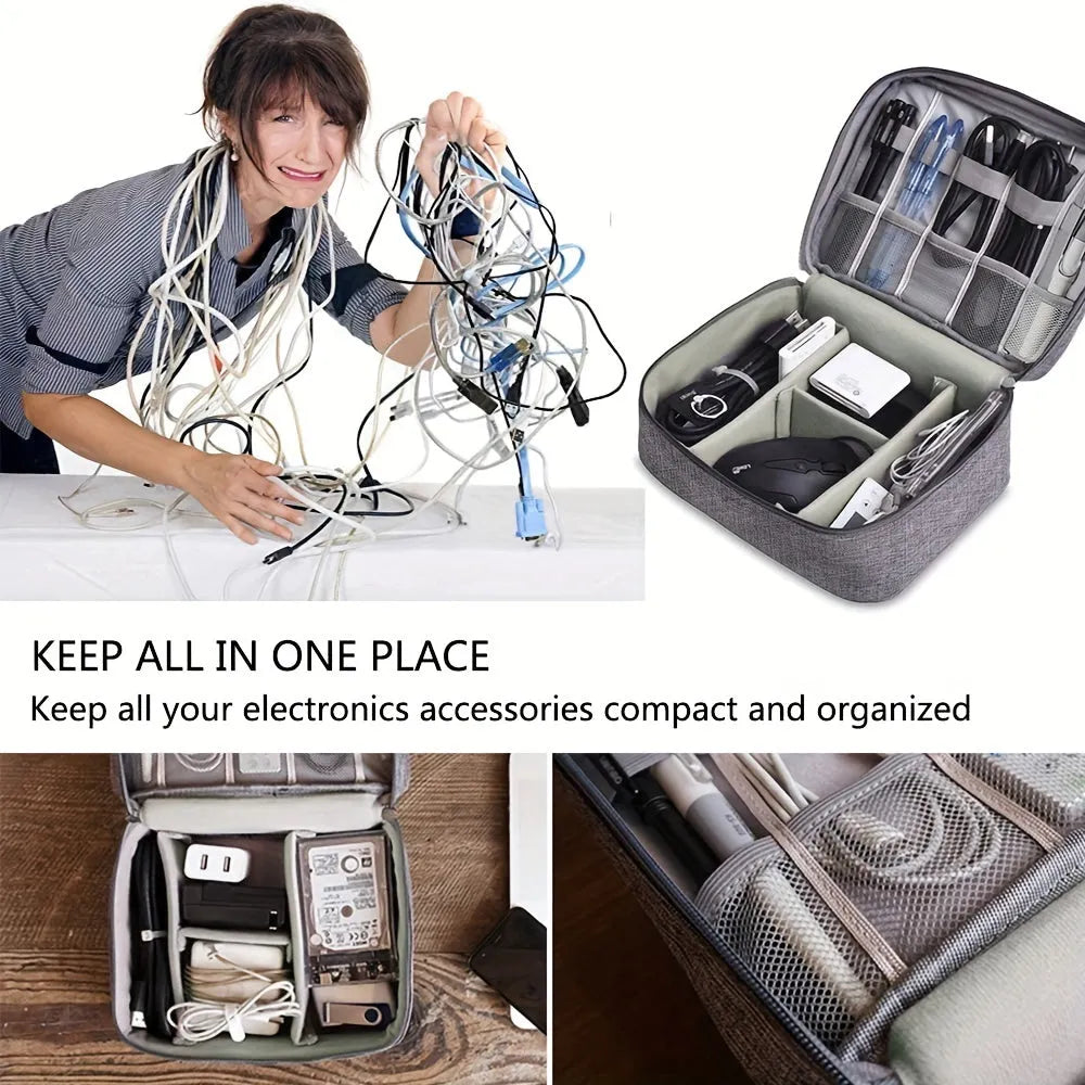 Black waterproof cable organizer bag open, showing removable dividers and mesh pockets for electronics.