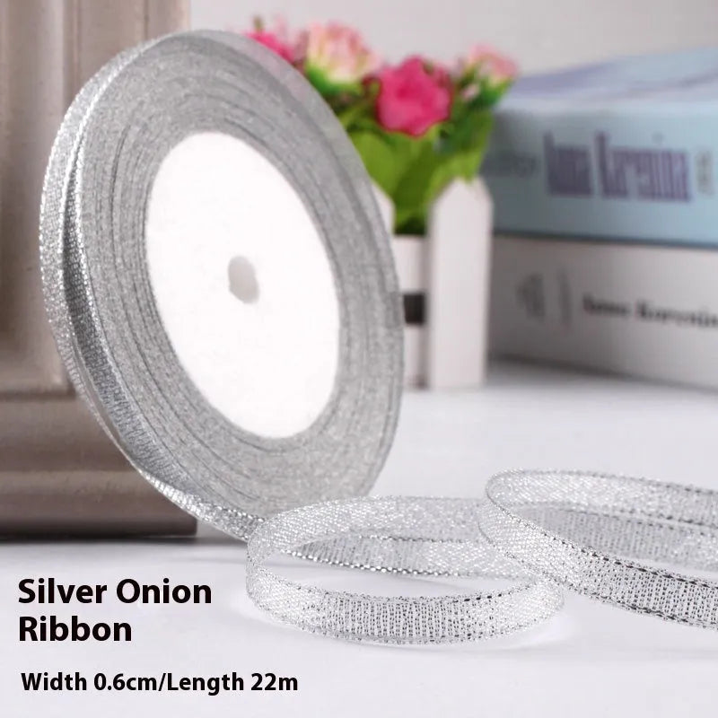 Roll of polyester gift packaging ribbon with 0.6cm width and 22 metre length in various colour options