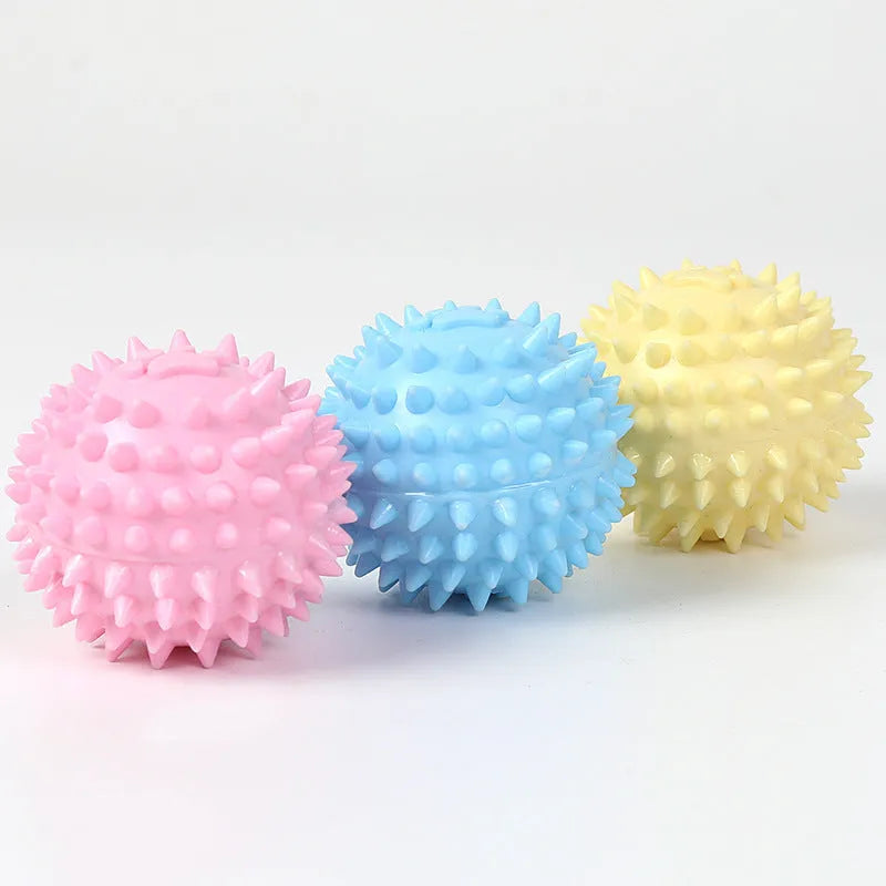 Blue TPR rubber dog chew ball with textured surface for tooth cleaning, 6cm diameter.