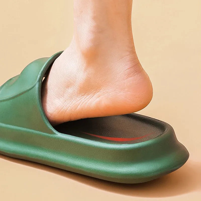 Thickened EVA non-slip flip-flop slippers in multiple colours on a bathroom floor.