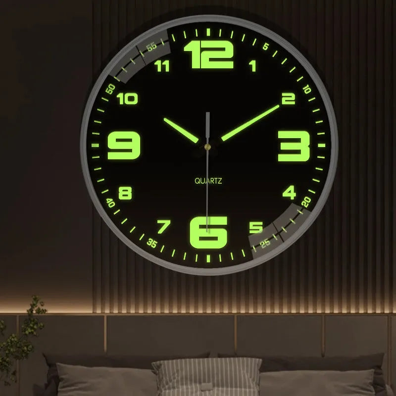 Modern 8-inch luminous wall clock with white plastic case on a wall.