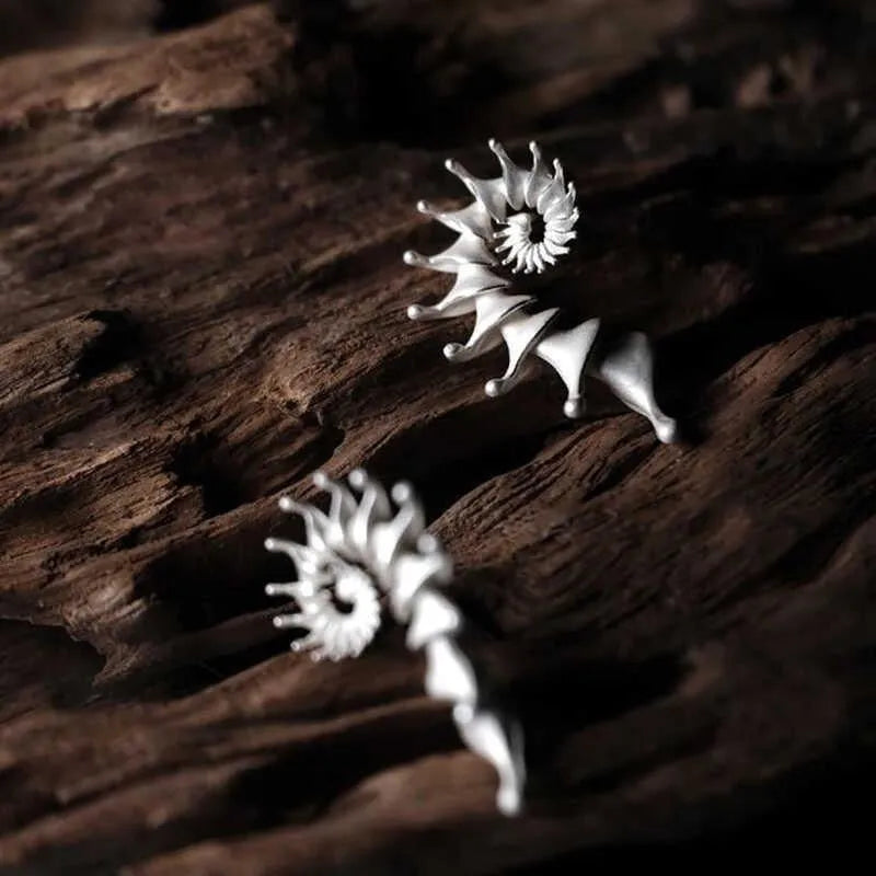 Alloy conch stud earrings with exaggerated three-dimensional shape and matte finish